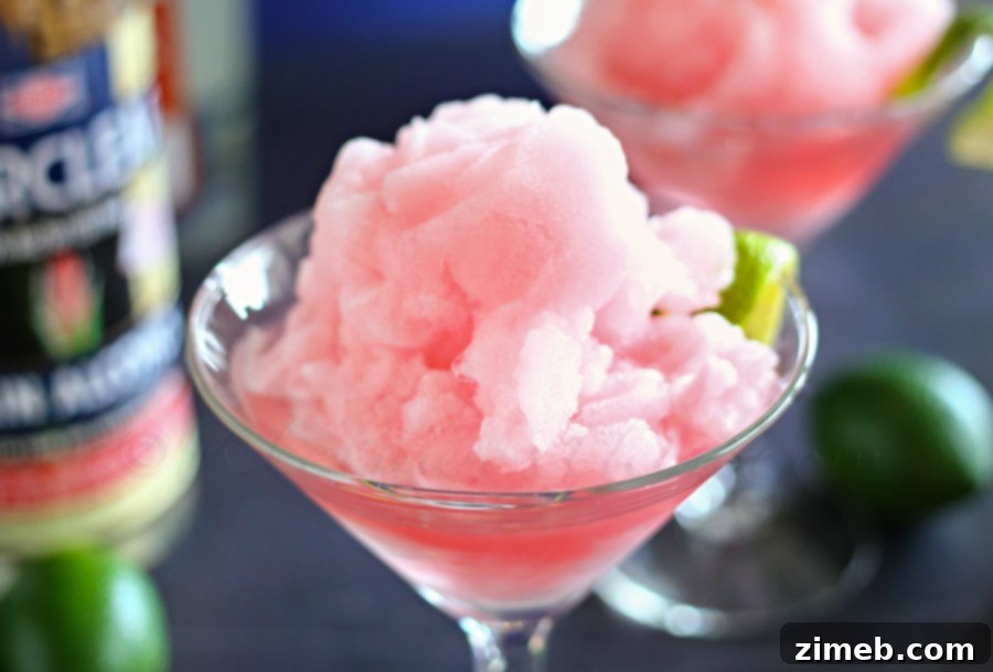 Close-up of a perfectly blended Twisted Frozen Cosmo in a martini glass