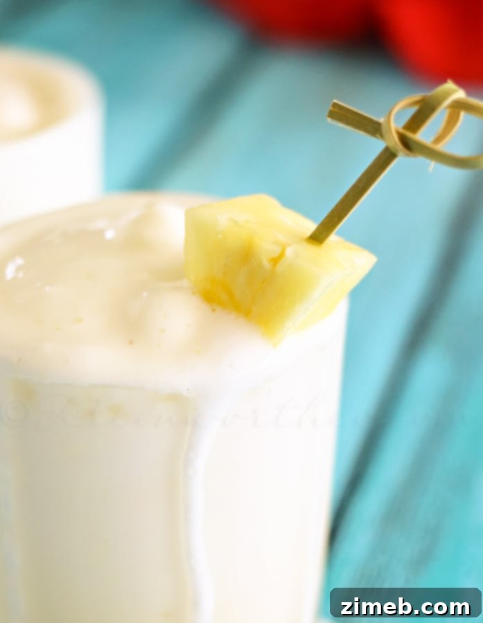 Tropical Pineapple Chill 3 Close-up of a Pineapple Cooler, showing its creamy, slushy texture.