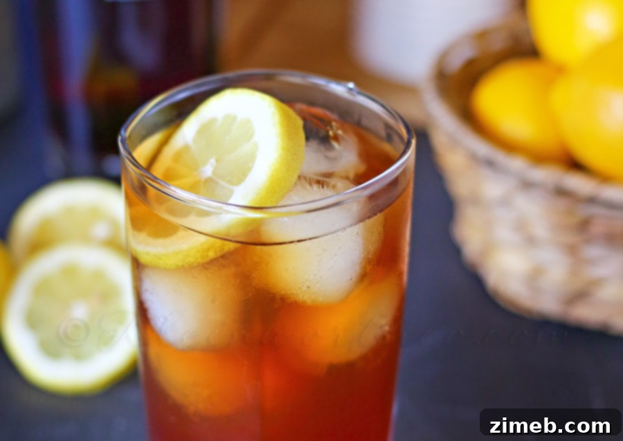 Crimson Chill Hard Tea 4 Outdoor picnic table adorned with food and glasses of Pomegranate Hard Iced Tea