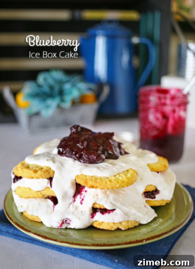 Blueberry Cloud Cake 3 A stunning side view of the layered Blueberry Ice Box Cake, ready for chilling. Notice the distinct layers of cookies and cream, promising a delicious and refreshing no-bake experience.