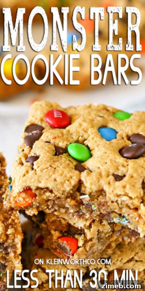 Kitchen Sink Cookie Bars 2 Delicious Monster Cookie Bars baked and ready to eat, highlighting their texture and vibrant M&M's.