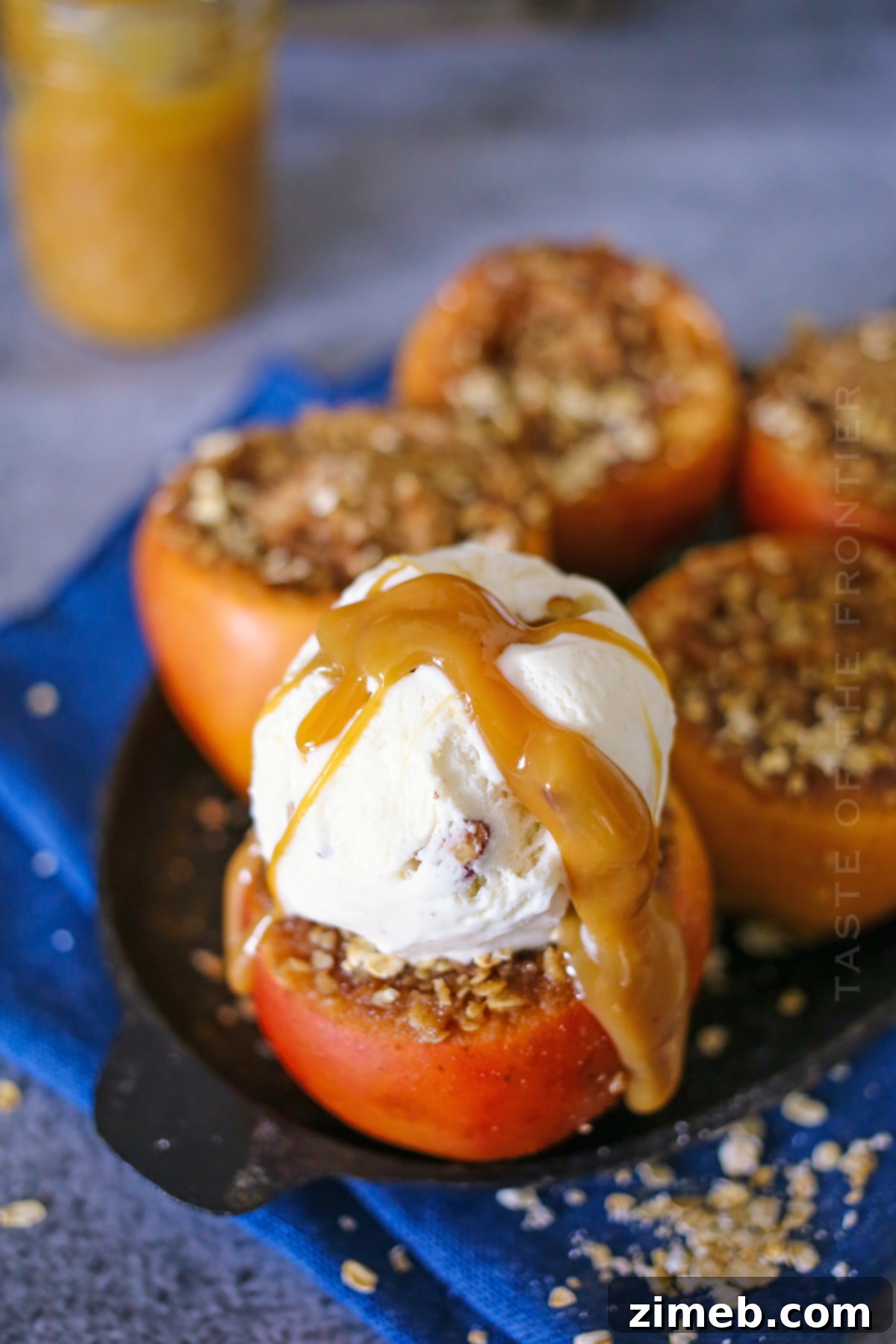 Ingredients for Crock Pot Baked Apples laid out on a table: apples, flour, sugars, butter, oats, cinnamon, salt.