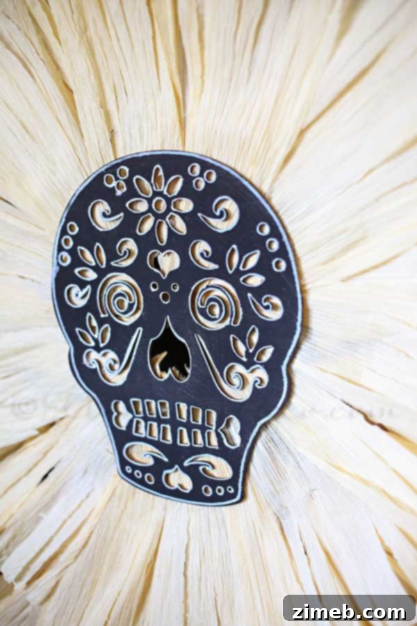 A beautifully completed Sugar Skull Corn Husk Wreath hanging proudly, showcasing intricate details