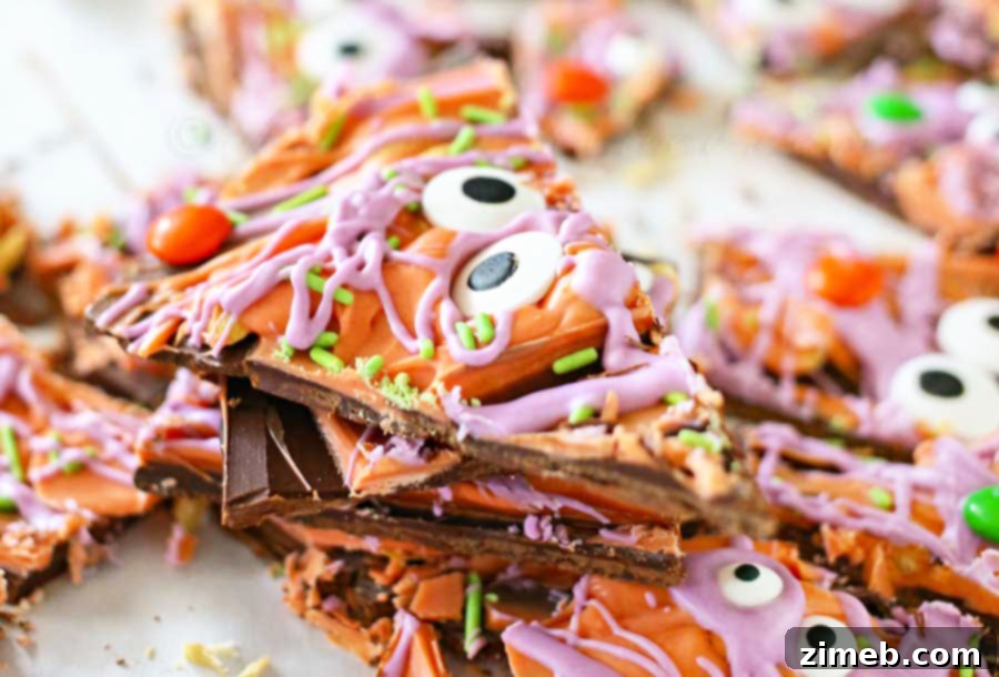 Monster Mash Bark 3 Close-up of Monster Bark featuring colorful candy melts, peanuts, and various candy eyes.