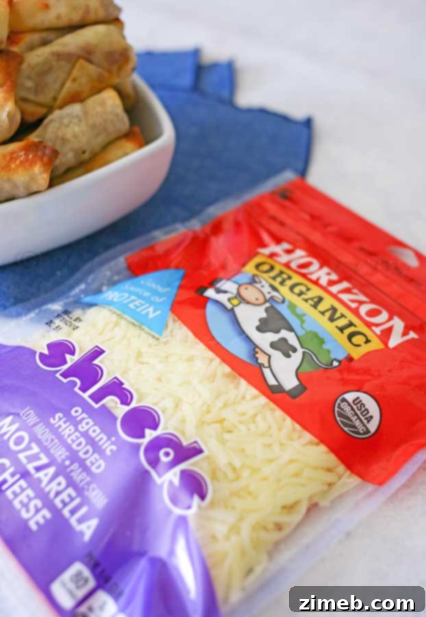 Ingredients for Cheesy Roast Beef Egg Roll Bites: wonton wrappers, beef, and cheese