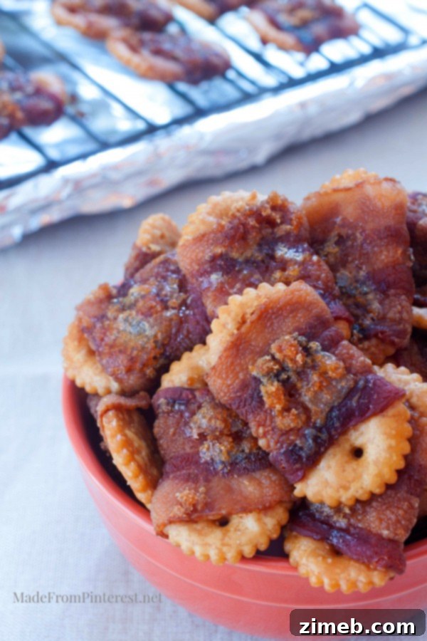 Crispy Brown Sugar Bacon Wrapped Crackers, glistening with caramelized brown sugar and savory bacon.