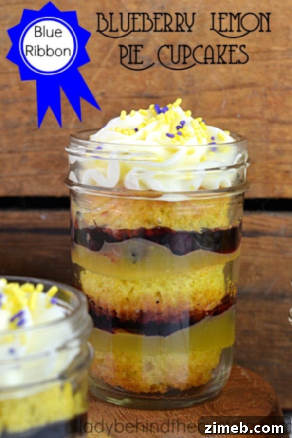 Delicate Blueberry Lemon Pie Cupcakes with a crumbly topping and a hint of lemon zest, perfectly baked.
