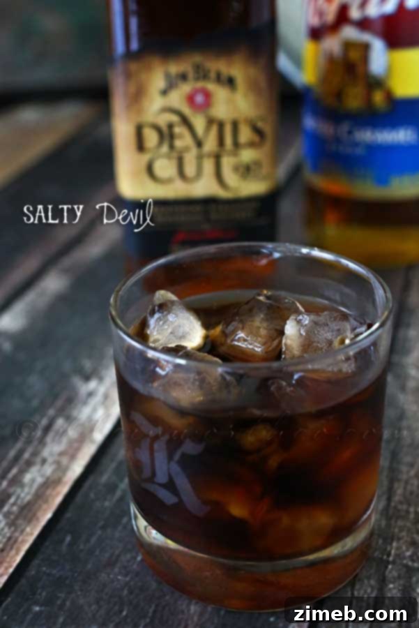 The Brine Fiend 2 Salty Devil Cocktail, a whiskey and cola drink with salted caramel