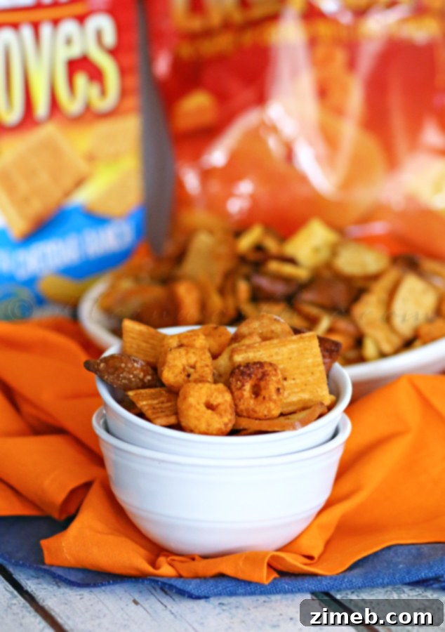 Creamy Bacon Alfredo Cheese Cups 8 Bowl of homemade Slow Cooker Snack Mix, perfect for parties.