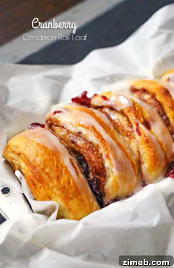 Cranberry Cinnamon Swirl Bread 2 Cranberry Cinnamon Roll Loaf - A festive and easy holiday breakfast idea.
