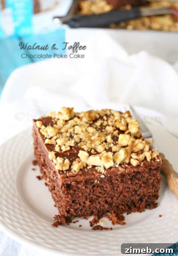 Decadent Walnut and Toffee Chocolate Poke Cake 2 Walnut & Toffee Chocolate Poke Cake, a rich dessert topped with nuts and toffee