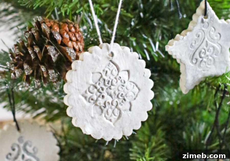 A collection of newly crafted Stamped Clay Ornaments, ready to be painted, showcasing the fun and ease of this DIY project.