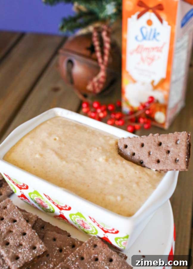 Creamy Dairy-Free Eggnog Dip 5 Ingredients for Dairy Free Eggnog Dip, including non-dairy cream cheese and nog, laid out on a kitchen counter