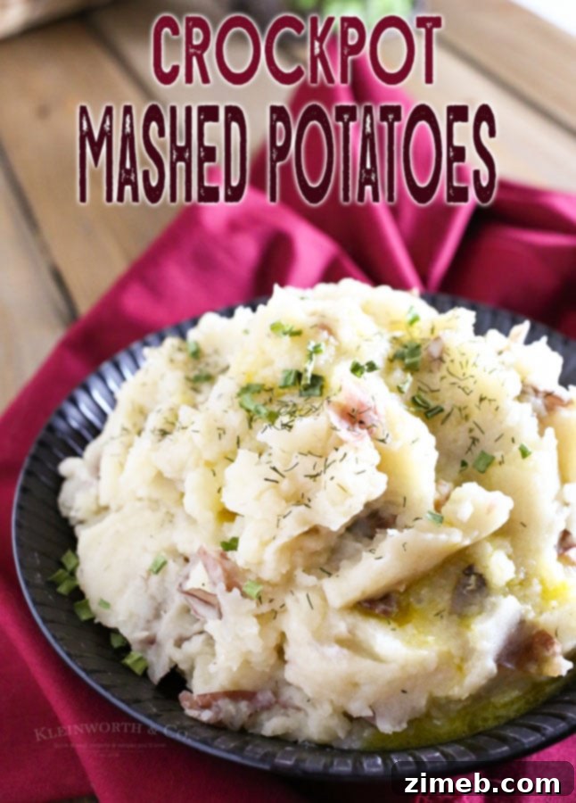 Effortless Slow Cooker Mashed Potatoes 9 A bowl of Crock Pot Mashed Potatoes ready to be served.
