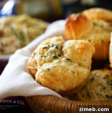 Garlic Parmesan Pull Apart Biscuits - loaded with homemade Italian Garlic Butter & Parmesan cheese. Ready in 20 minutes. Don't miss the recipe for the butter too! It's AMAZING on everything.