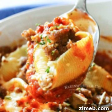 Crispy Oven Baked Chicken Thighs 11 A close-up of stuffed pasta shells filled with a creamy ricotta mixture, topped with marinara sauce and melted cheese.