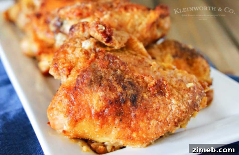 Crispy Oven Baked Chicken Thighs 4 Simplify your dinner with this Oven Fried Chicken that comes out crispy & delicious in about an hour. Less mess & clean up, the best baked chicken recipe. Ever!