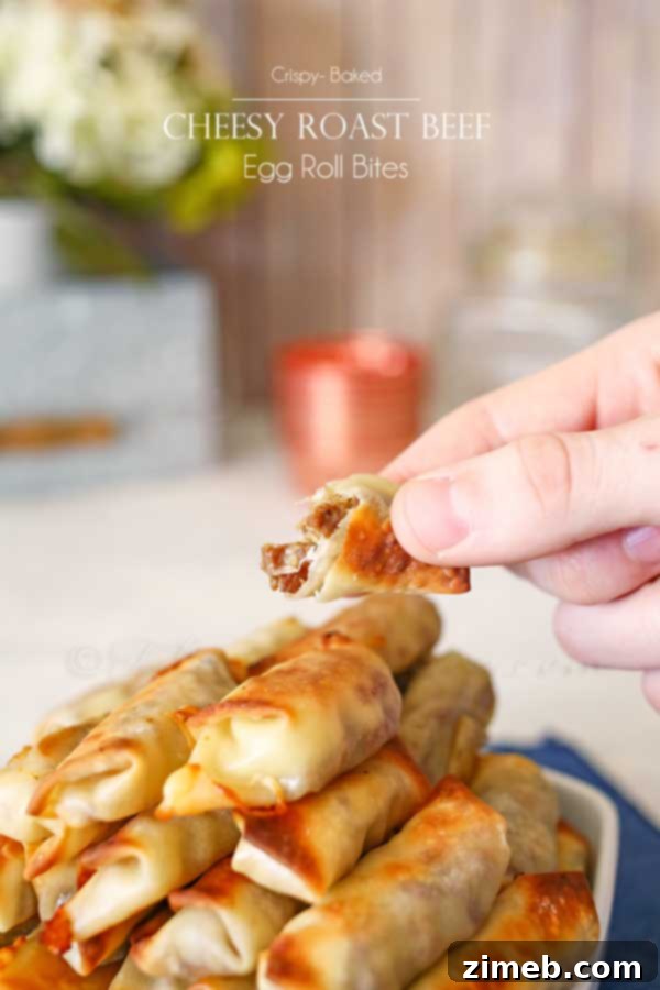 Crunchy and savory cheesy roast beef egg roll bites, filled with tender roast beef and melted cheese, perfect for dipping.