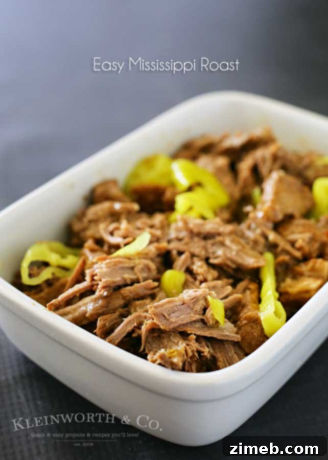 Effortless Mississippi Pot Roast 5 A hearty serving of Mississippi Roast, showcasing its rich, savory appearance.