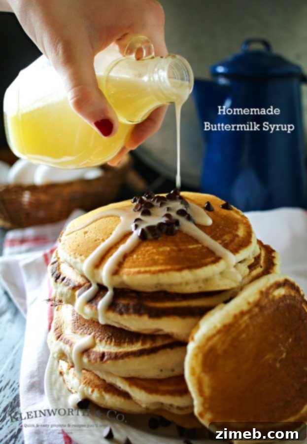 Farmhouse Buttermilk Syrup 6 Homemade buttermilk syrup cooling in a glass measuring cup.