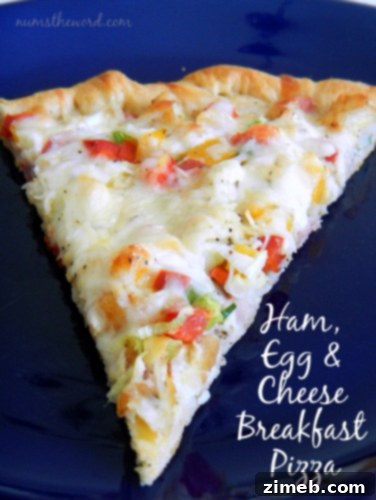 25 Delicious Egg Recipes 14 Slice of Ham, Egg & Cheese Breakfast Pizza with a golden crust.