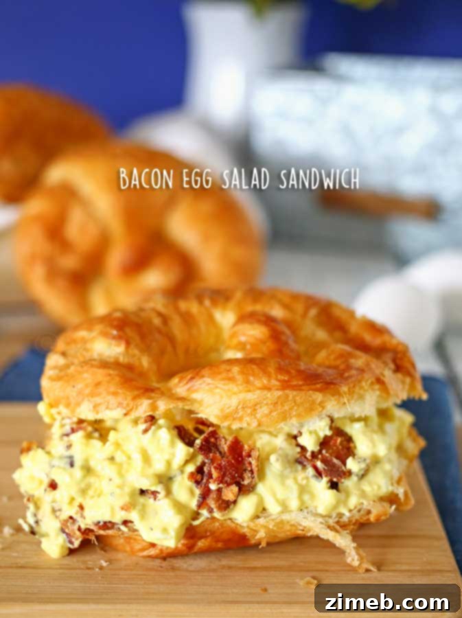 25 Delicious Egg Recipes 18 Hearty Bacon Egg Salad Sandwich, filled with creamy egg salad and crispy bacon.