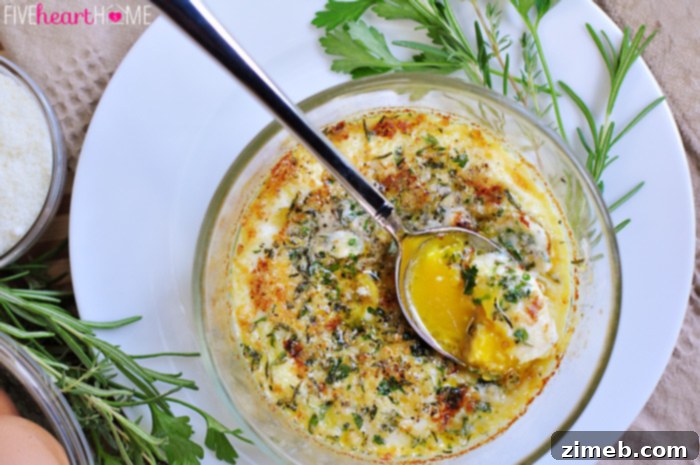 25 Delicious Egg Recipes 7 Individual Herb Baked Eggs served in ramekins, garnished with fresh herbs.