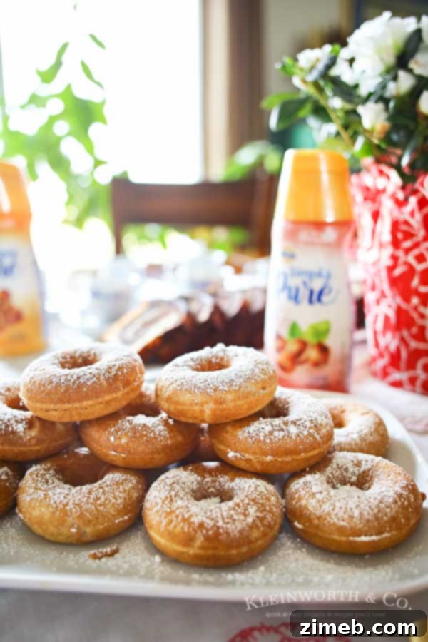 Caramel Swirled Whole Wheat Delights 11 A beautifully arranged coffee party table featuring an assortment of snacks, drinks, and decorative elements.