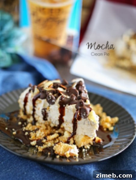 Caramel Swirled Whole Wheat Delights 16 A slice of rich Mocha Cream Pie with whipped topping, on a white plate, ready to be enjoyed.