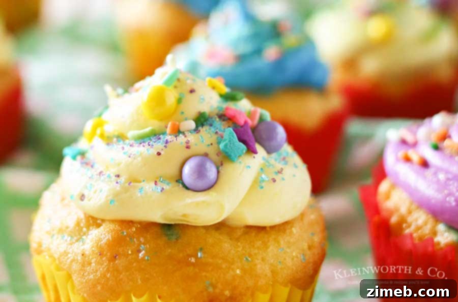 Easter Funfetti Cupcakes 6 A colorful assortment of freshly decorated Funfetti Easter cupcakes on a serving platter