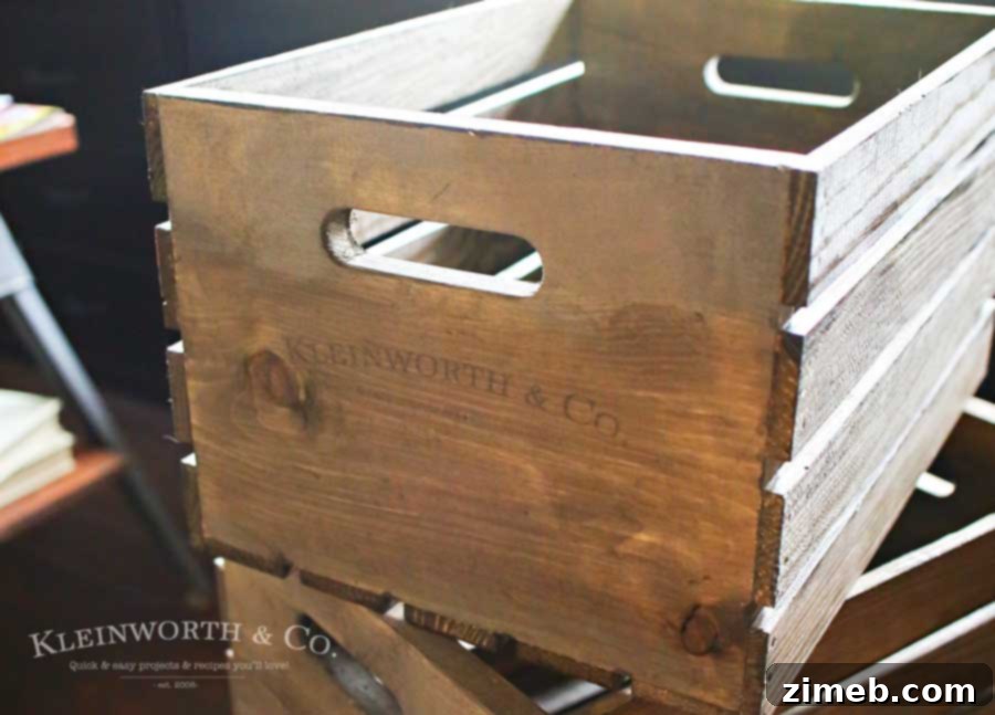 Crafting Vintage Crates: Effortless Image Transfer for Rustic Decor 7 A stack of newly stained wooden crates ready for image transfer