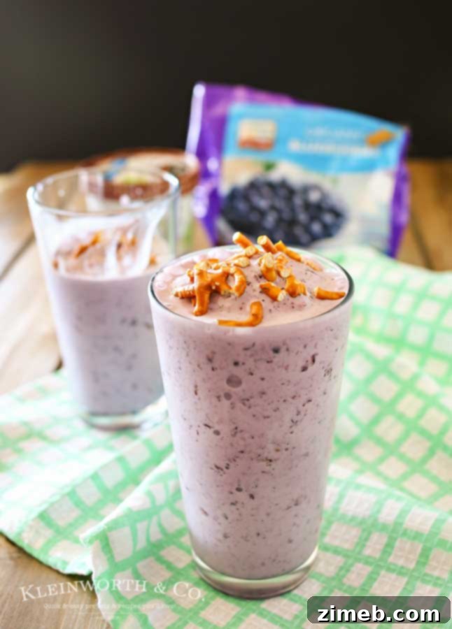 Vegan Blueberry Coconut Shake 5 Blueberry Coconut Shake garnished with crushed pretzels, ready to be enjoyed.