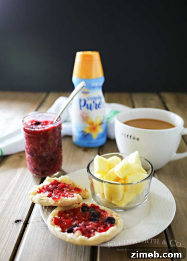 Double Berry Freezer Jam is a simple homemade preserves recipe that takes just about 10 minutes. Perfect for all that summer fruit from the garden! It's great with breakfast or paired with your peanut butter. I even like to add some to my ice cream!
