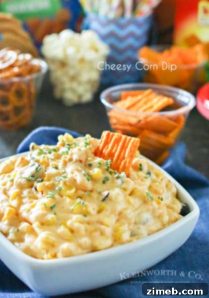 Street Corn Salsa 6 Crock Pot Cheesy Corn Dip, a warm and zesty dip with corn and cheese, ideal for game day snacks.