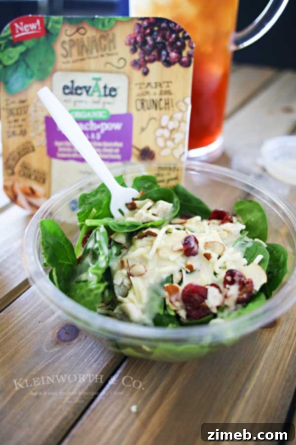 Sip and Savor: Vanilla Coconut Black Tea and Elevate Organic Salads 2 A tall glass of Vanilla Coconut Black Tea, garnished with a slice of lime, sitting on a wooden table, emphasizing its refreshing quality.