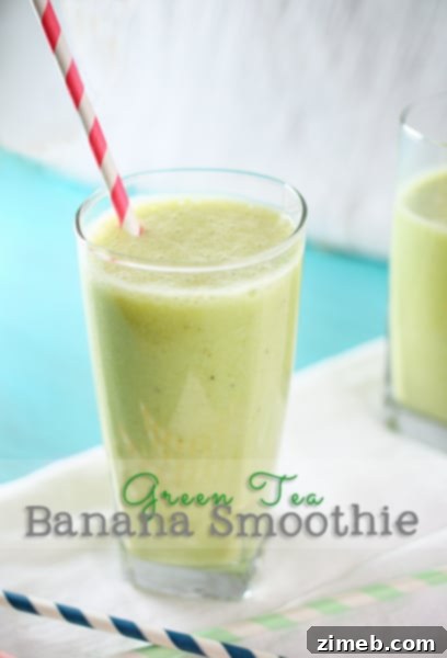 A vibrant green tea banana smoothie in a glass with a straw, a healthy and energizing drink.