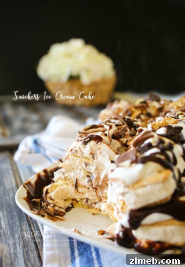 Ultimate Snickers Ice Cream Cake 3 Snickers Ice Cream Cake is made with salted caramel ice cream bars, whipped cream & loaded with Snickers candy bars. It's over the top amazing!