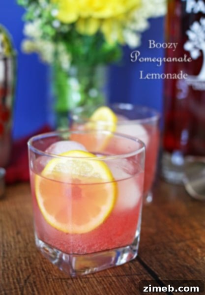 Peachwood Palmer 7 Boozy Pomegranate Lemonade - a sweet and tart cocktail perfect for summer.