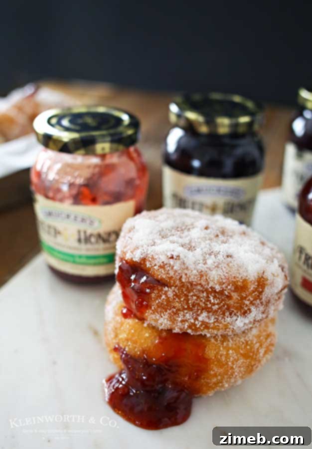 Close-up of Easy Strawberry Jalapeño Donuts, highlighting the delicious texture and vibrant filling