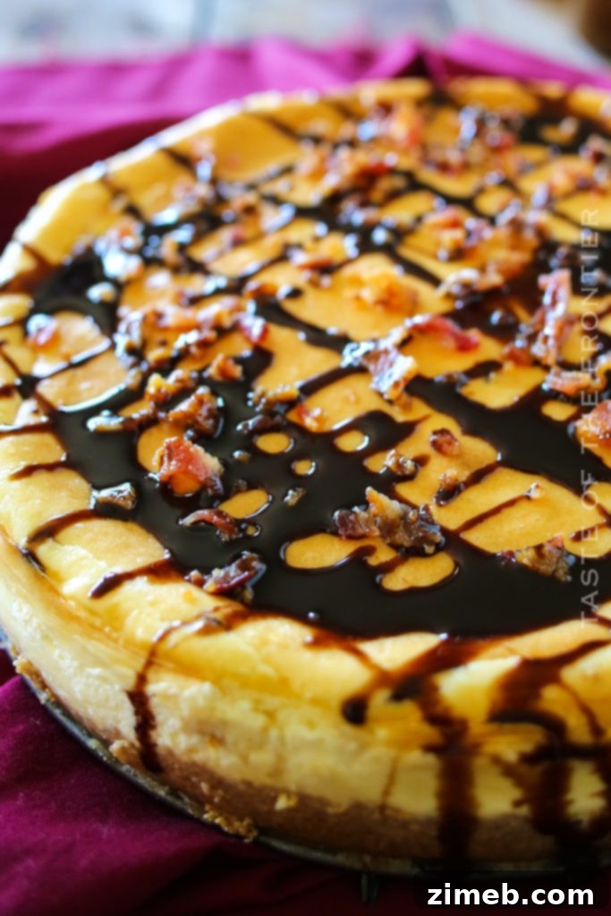 Heavenly Bacon Bourbon Caramel Cheesecake 6 A perfectly smooth and creamy cheesecake slice, showcasing the rich texture and delicious toppings.
