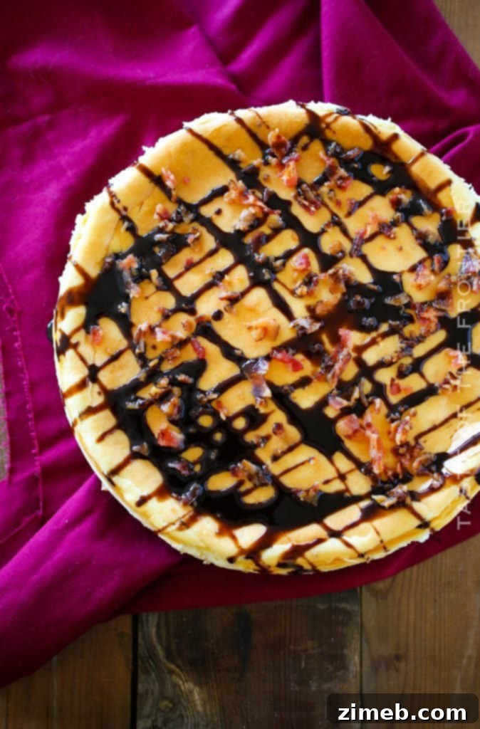 Heavenly Bacon Bourbon Caramel Cheesecake 8 A side view of the bourbon caramel cheesecake, showing its impressive height and layers.