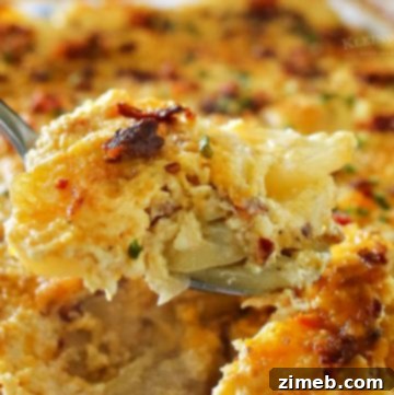Cooked Bacon Scalloped Potatoes, a golden and bubbly casserole, ready to serve.