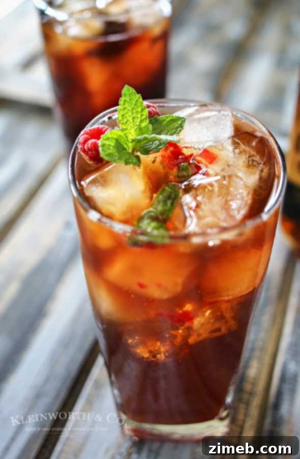 Raspberry Mint Iced Tea is a refreshing summer drink recipe, perfect for a hot day. Fresh raspberries, mint & a little lemon makes this tea perfect.