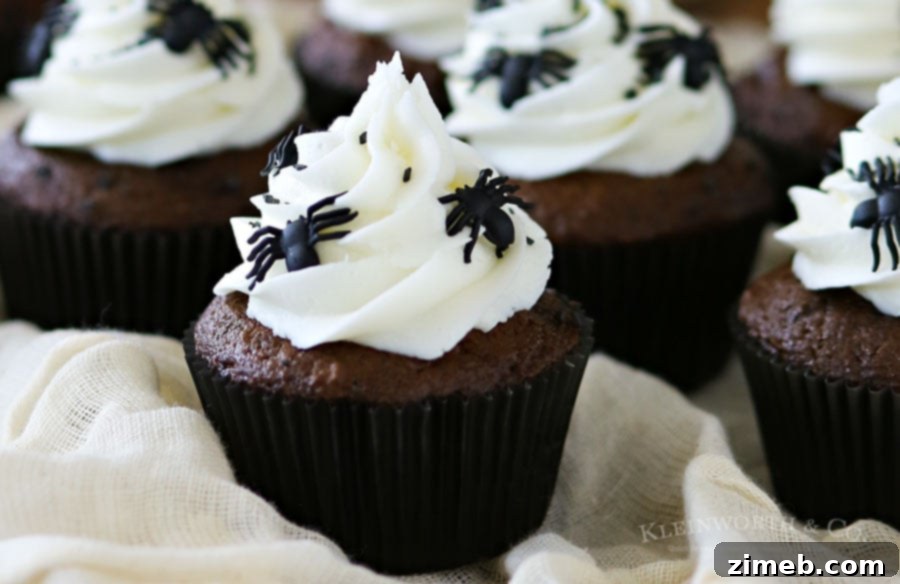 Ghastly Spider Bites 2 Close-up of Creepy Halloween Spider Cupcakes on a tiered stand