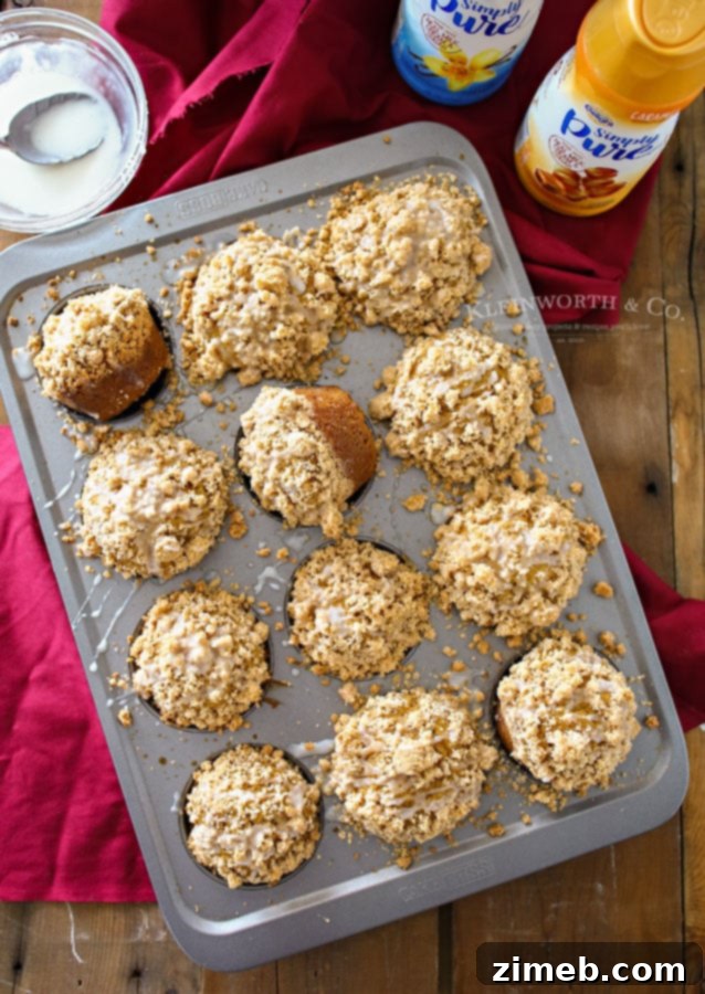 Crumble-Topped Pumpkin Harvest Muffins 3 Close-up of Best Pumpkin Streusel Muffins with salted caramel glaze