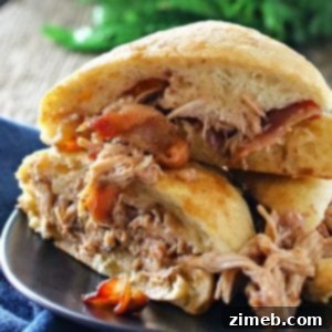 Raspberry Chipotle Chicken Sliders, a sweet and spicy slow cooker recipe for easy family dinners.