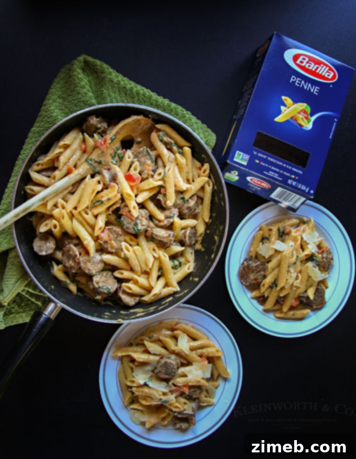Classic Sausage Penne Alfredo 4 Close-up of creamy Penne Sausage Alfredo, highlighting the rich sauce and ingredients.