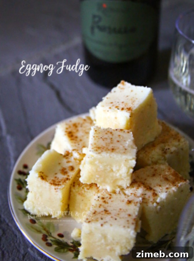 Melt Away Holiday Stress with Eggnog Fudge 9 A slice of Eggnog Fudge on a festive background.