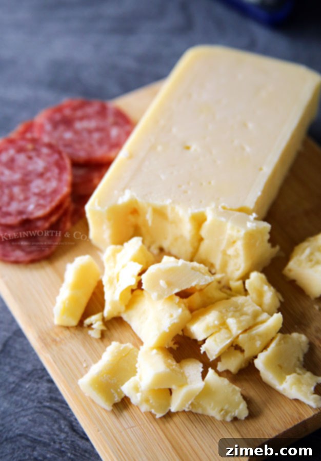 Platter of Blue Cheese Salami Appetizers with a wine glass