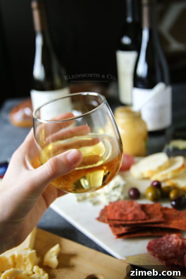 Elegant spread of Blue Cheese Salami Appetizers and wine glasses